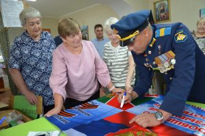 Герой России навестил волонтёров